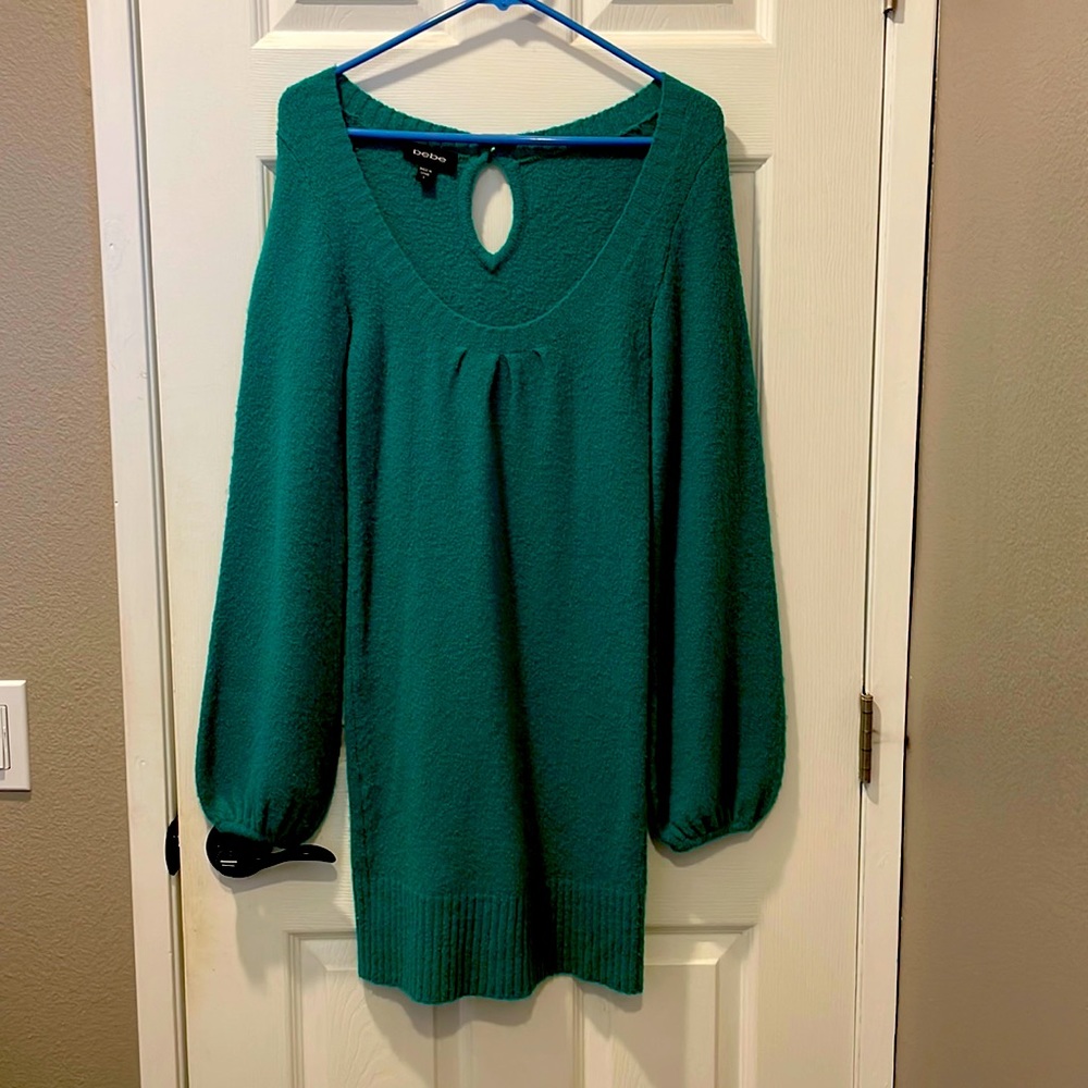 Bebe sweater dress in greenish teal. Bubble sleeves, form fitted